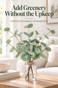 Artificial eucalyptus arrangement in a glass vase on a warm coffee table with the headline Add Greenery Without the Upkeep.