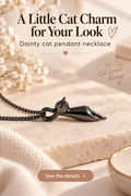 Gunmetal cat pendant necklace on cream marble with headline A Little Cat Charm for Your Look.