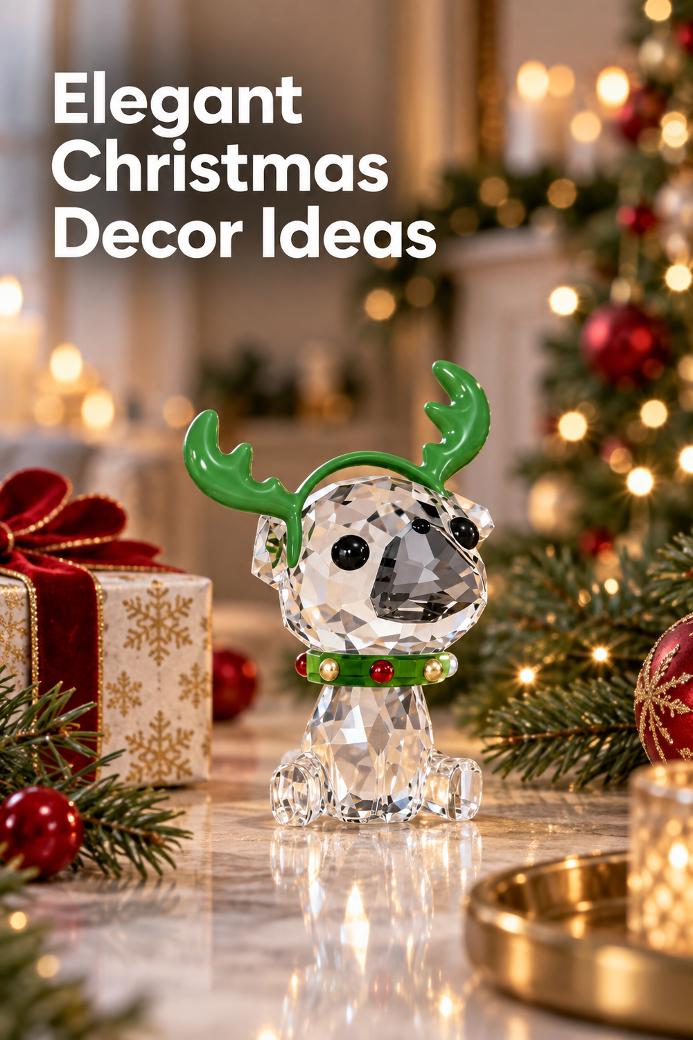 Vertical holiday lifestyle scene with the headline “Elegant Christmas Decor Ideas” in large white type at the upper left. A clear faceted crystal pug wearing bright green antlers and a green collar with red and gold accents sits on a reflective tabletop. Evergreen branches, red ornaments, a wrapped gift with a velvet bow, warm candlelight, and a softly blurred Christmas tree behind it surround the figurine in a cozy, warm red, green, and gold setting.