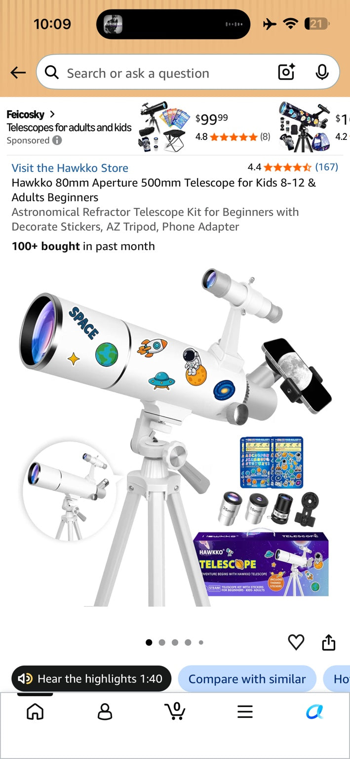 Amazon product screenshot showing the white Hawkko beginner telescope on a tripod with space-themed stickers, eyepieces, Barlow lens, phone adapter, and retail packaging.