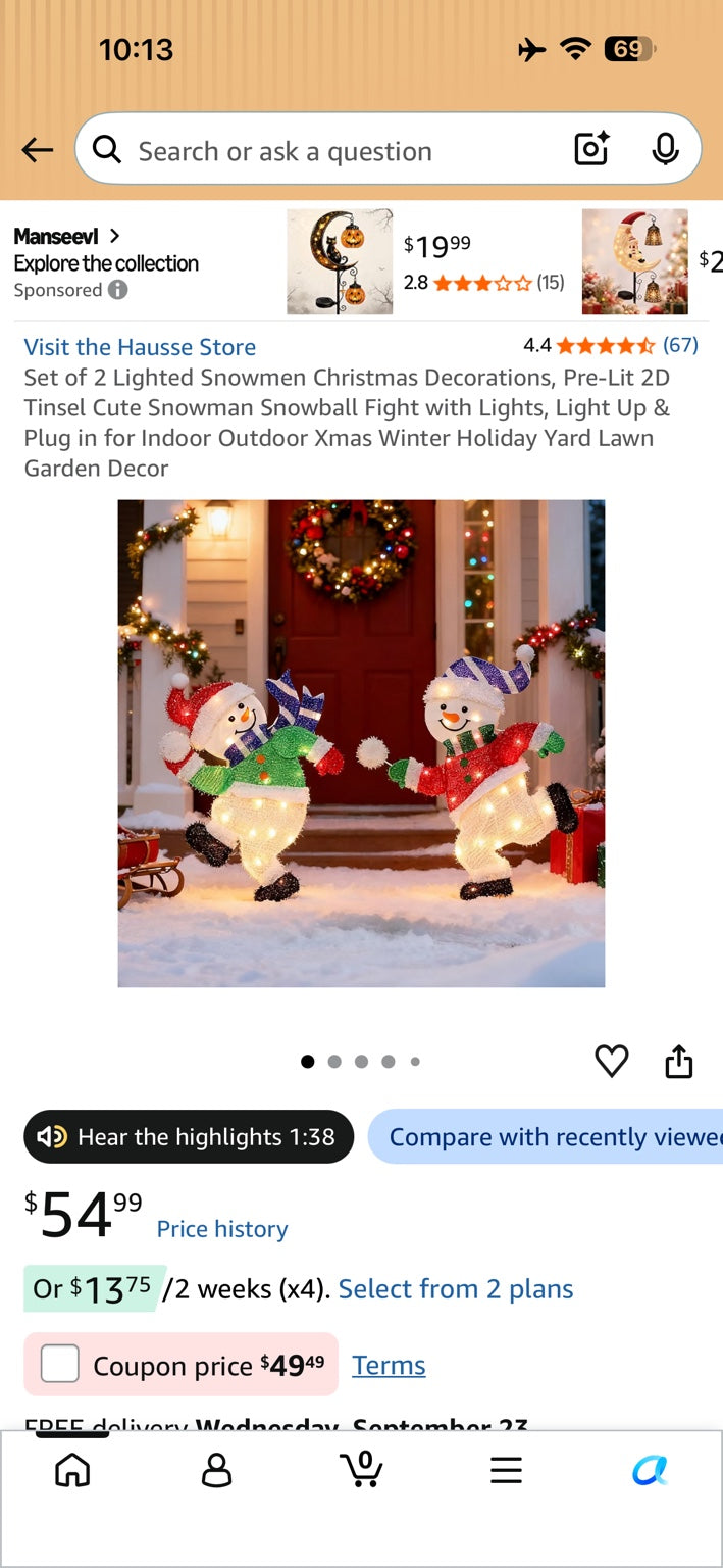 Amazon product screenshot showing a set of two lighted snowmen playing in a snowy holiday yard.