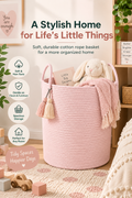 Large pink cotton rope storage basket with handles in a cozy nursery holding a blanket and toys, with the headline A Stylish Home for Life’s Little Things.