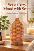Tan woven rattan essential oil diffuser releasing mist in a warm home setting with the headline Set a Cozy Mood with Scent.